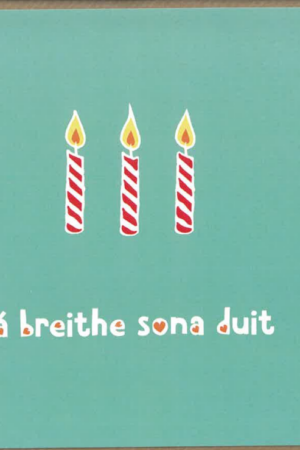 Lá breithe sona duit (candles on green background)